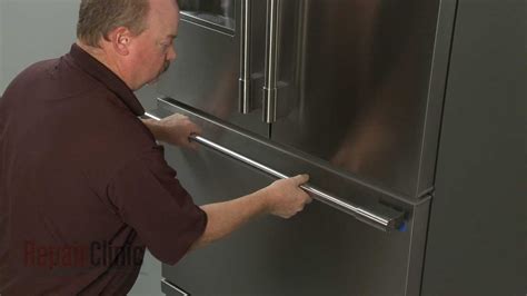 Pull down the small metal clip off the housing that holds the fill tube (though not all ice makers have this clip). . How to replace bosch fridge door handle